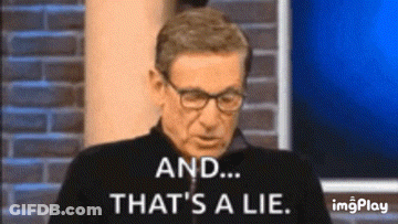 A Man Wearing Glasses Is Sitting In Front Of A Brick Wall And Says `` And ... That 'S A Lie . '' GIF