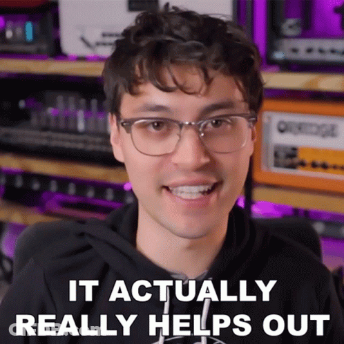A Man Wearing Glasses Is Smiling And Says It Actually Helps Out GIF