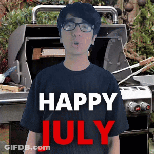 A Man Wearing Glasses Is Standing In Front Of A Grill And Says Happy July GIF