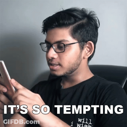 Man With Glasses Looking At Phone 'S So Tempting GIF