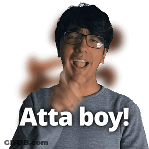 A Man Wearing Glasses Says Atta Boy While Pointing GIF