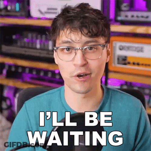 A Man Wearing Glasses Says " I 'Ll Be Waiting " GIF