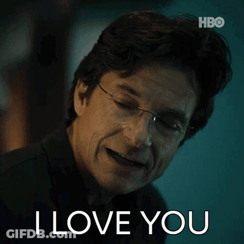 A Man Wearing Glasses Says " I Love You " In Front Of A Hbo Logo GIF