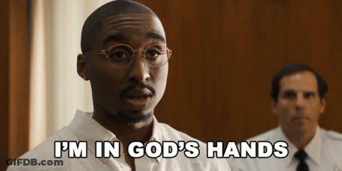 A Man Wearing Glasses Says " I 'M In God 'S Hands " GIF