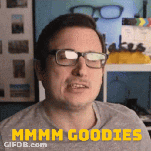 A Man Wearing Glasses Says " Mmmm Goodies " In Yellow GIF