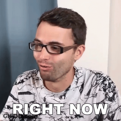 A Man Wearing Glasses Says Right Now GIF