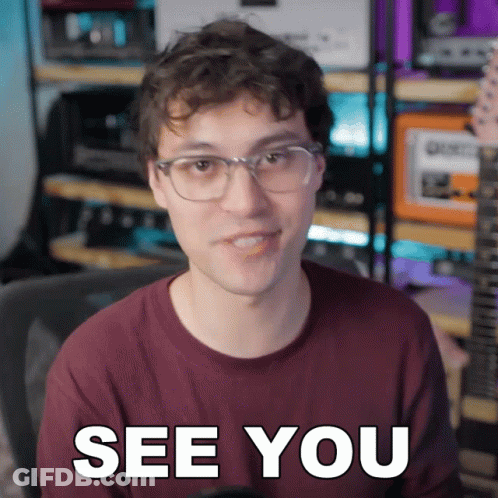 A Man Wearing Glasses Says See You In Front Of A Guitar GIF