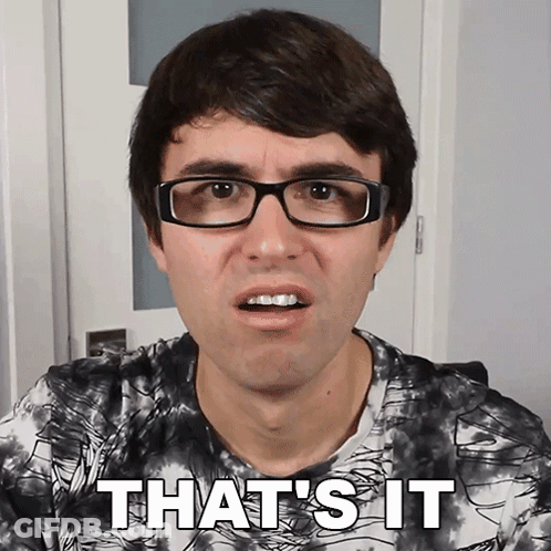 A Man Wearing Glasses Says That 'S It In Front Of A Door GIF