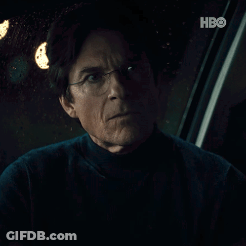 A Man Wearing Glasses Says What Is It GIF