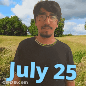 A Man Wearing Glasses Stands In A Field With The Date Of July 25 GIF