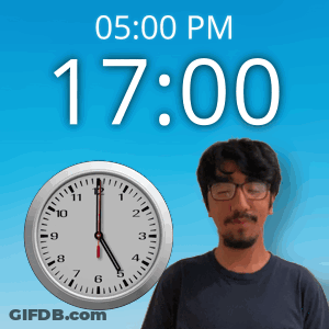 A Man Wearing Glasses Stands In Front Of A Clock That Says 5:00 Pm GIF