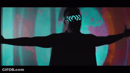A Man Wearing Glow In The Dark Glasses Is Dancing GIF