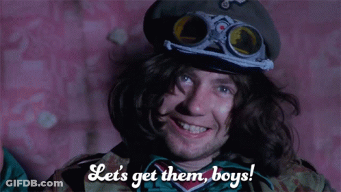 A Man Wearing Goggles And A Hat Says Let 'S Get Them Boys GIF