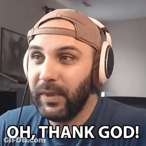 A Man Wearing Headphones And A Baseball Cap Says Oh Thank God GIF