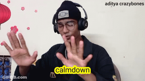 A Man Wearing Headphones And A Beanie Says Calmdown In Yellow Letters GIF