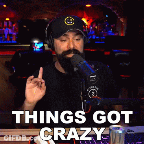 A Man Wearing Headphones And A Black Hat Says Things Got Crazy GIF