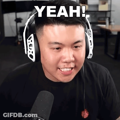 A Man Wearing Headphones And A Black Shirt Says " Yeah " GIF