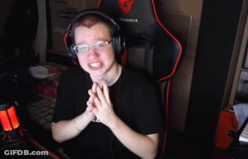 A Man Wearing Headphones And A Black Shirt That Says #Freebat On It GIF