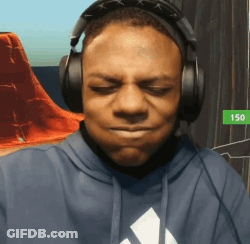 A Man Wearing Headphones And A Blue Adidas Hoodie GIF