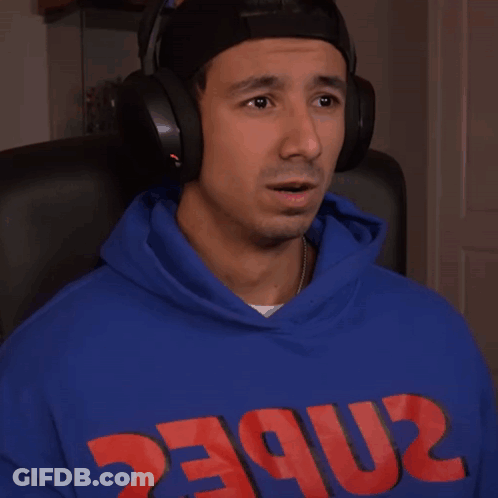 A Man Wearing Headphones And A Blue Hoodie That Says 2Nbec On It GIF