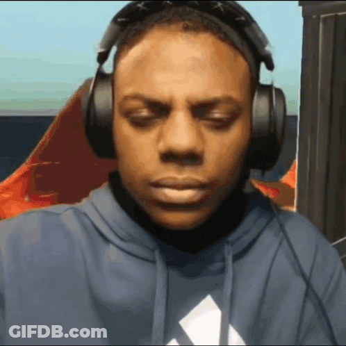 A Man Wearing Headphones And A Blue Hoodie With An Adidas Logo On It GIF