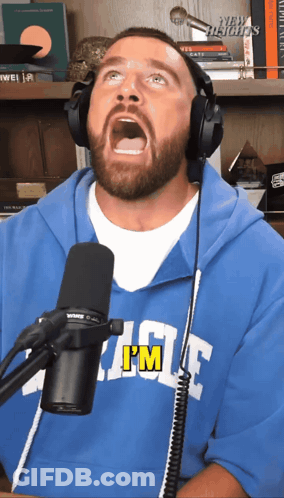 A Man Wearing Headphones And A Blue Shirt That Says I 'M On It GIF