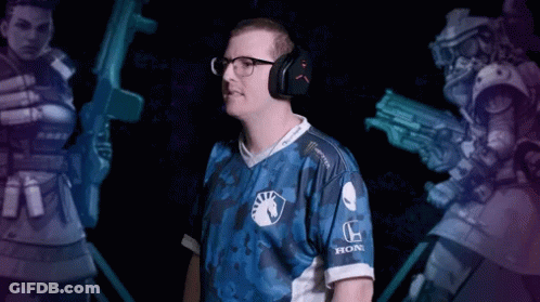 A Man Wearing Headphones And A Blue Shirt With The Word Honda On The Sleeve GIF