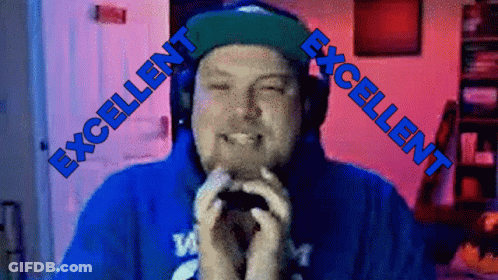 A Man Wearing Headphones And A Blue Shirt With The Words Excellent On The Bottom GIF