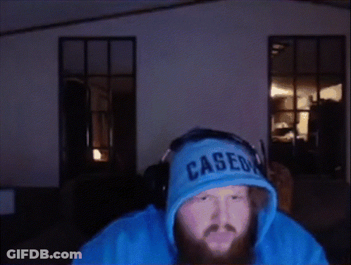 A Man Wearing Headphones And A Cased Hoodie GIF