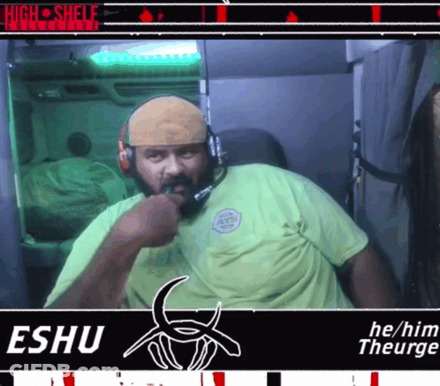 A Man Wearing Headphones And A Green Shirt With The Name Eshu GIF