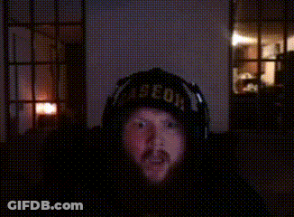 A Man Wearing Headphones And A Hat That Says " Aeon " GIF
