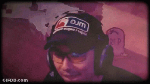 A Man Wearing Headphones And A Hat That Says Jm GIF