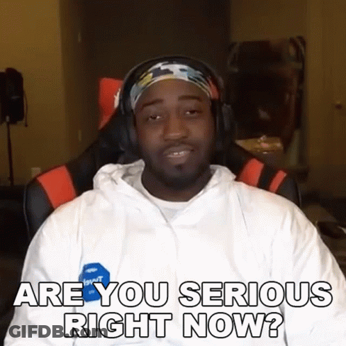 A Man Wearing Headphones And A Headband Is Asking If He Is Serious Right Now GIF