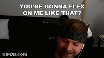 A Man Wearing Headphones And A Headband Is Sitting On A Couch And Talking To Someone . GIF