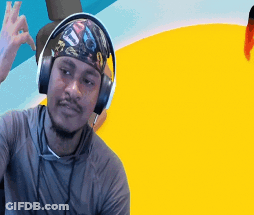 A Man Wearing Headphones And A Headband With A Picture Of Cars On It GIF
