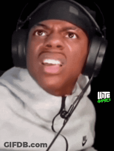 A Man Wearing Headphones And A Headband With Lite Games On The Bottom GIF