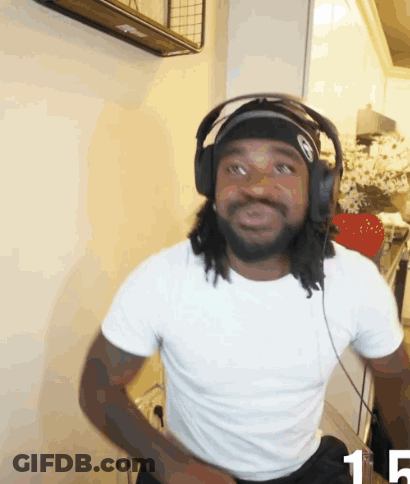 A Man Wearing Headphones And A Headband With The Number 15 On The Bottom GIF
