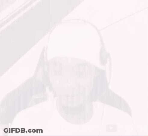 A Man Wearing Headphones And A Headband With The Words Flight 23 White On The Bottom Right GIF