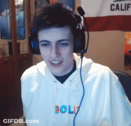 A Man Wearing Headphones And A Hoodie That Says Golf GIF