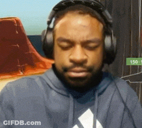 A Man Wearing Headphones And A Hoodie With An Adidas Logo GIF