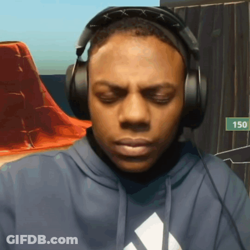 A Man Wearing Headphones And A Hoodie With The Number 150 In The Background GIF