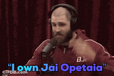 A Man Wearing Headphones And A Jacket That Says Bjp On It GIF