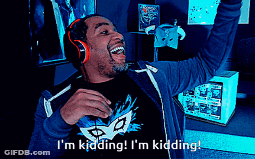 A Man Wearing Headphones And A Mask Says I 'M Kidding I 'M Kidding GIF