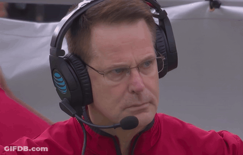 A Man Wearing Headphones And A Microphone Has A Blue Circle On The Left Ear GIF