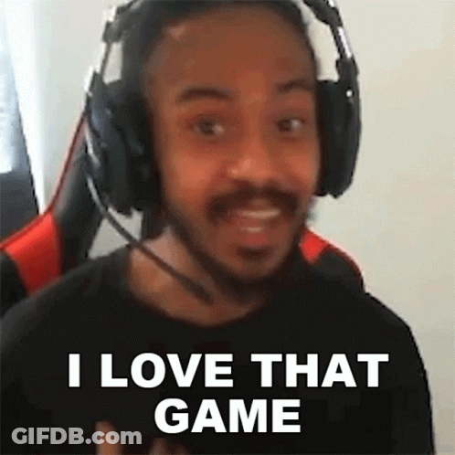 A Man Wearing Headphones And A Microphone Is Making A Funny Face And Saying `` I Love That Game '' . GIF