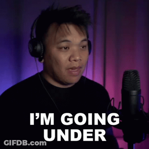 A Man Wearing Headphones And A Microphone Is Saying I 'M Going Under GIF