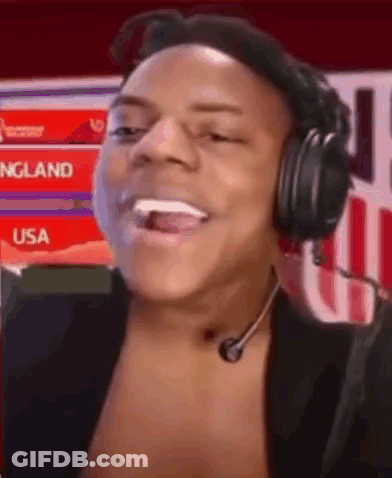 A Man Wearing Headphones And A Microphone Is Smiling . GIF