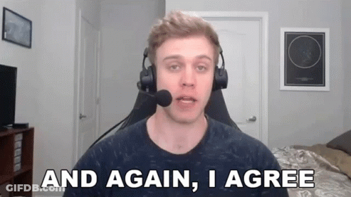 A Man Wearing Headphones And A Microphone Says And Again , I Agree GIF