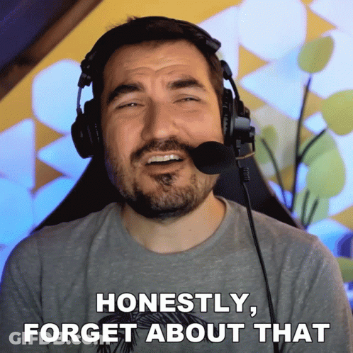 A Man Wearing Headphones And A Microphone Says Honestly Forget About That GIF