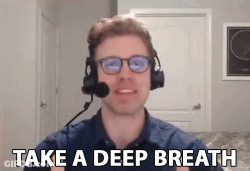 A Man Wearing Headphones And A Microphone Says Take A Deep Breath GIF
